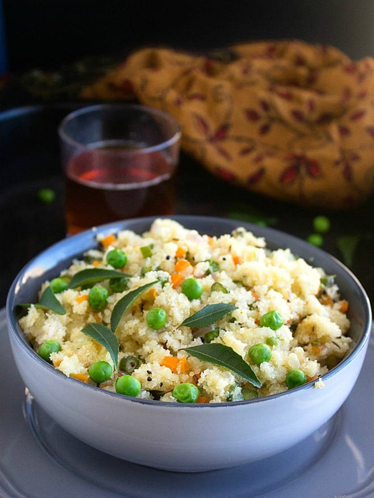 Upma is served in a bowl