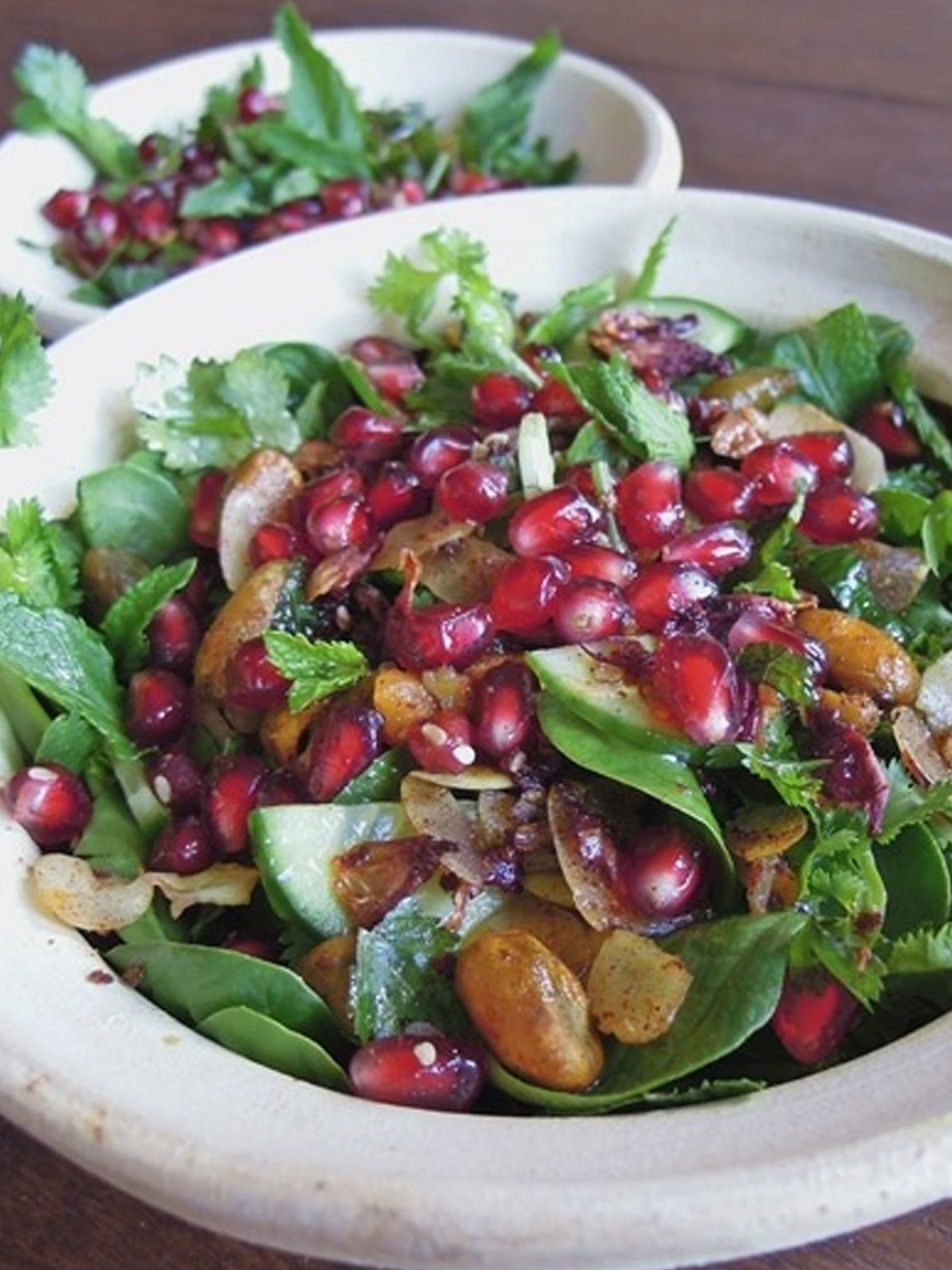 A salad is served in a bowl