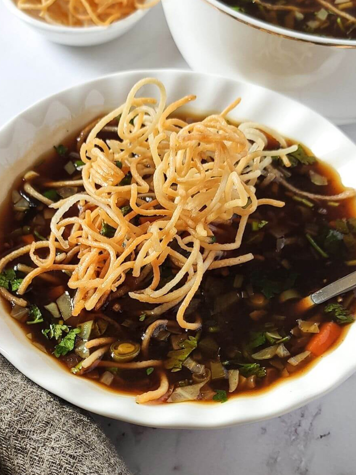 Veg Manchow Soup Recipe served in a bowl